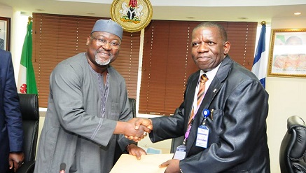 (L-r): Engr. Ubale Maska, executive commissioner, Technical Services who represented the EVC and Dr. Victor Olugbemiga Matthews of the Covenant University during the presentation of the grant Of Two Million Five Hundred Naira To The Lead Researcher On “Implementation Of A Software-Based Nomadic Base Station (NBS)